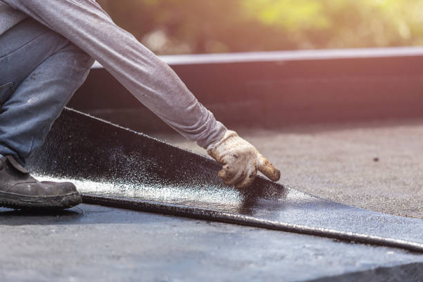 Professional Basement Waterproofing technician working in Huron, OH